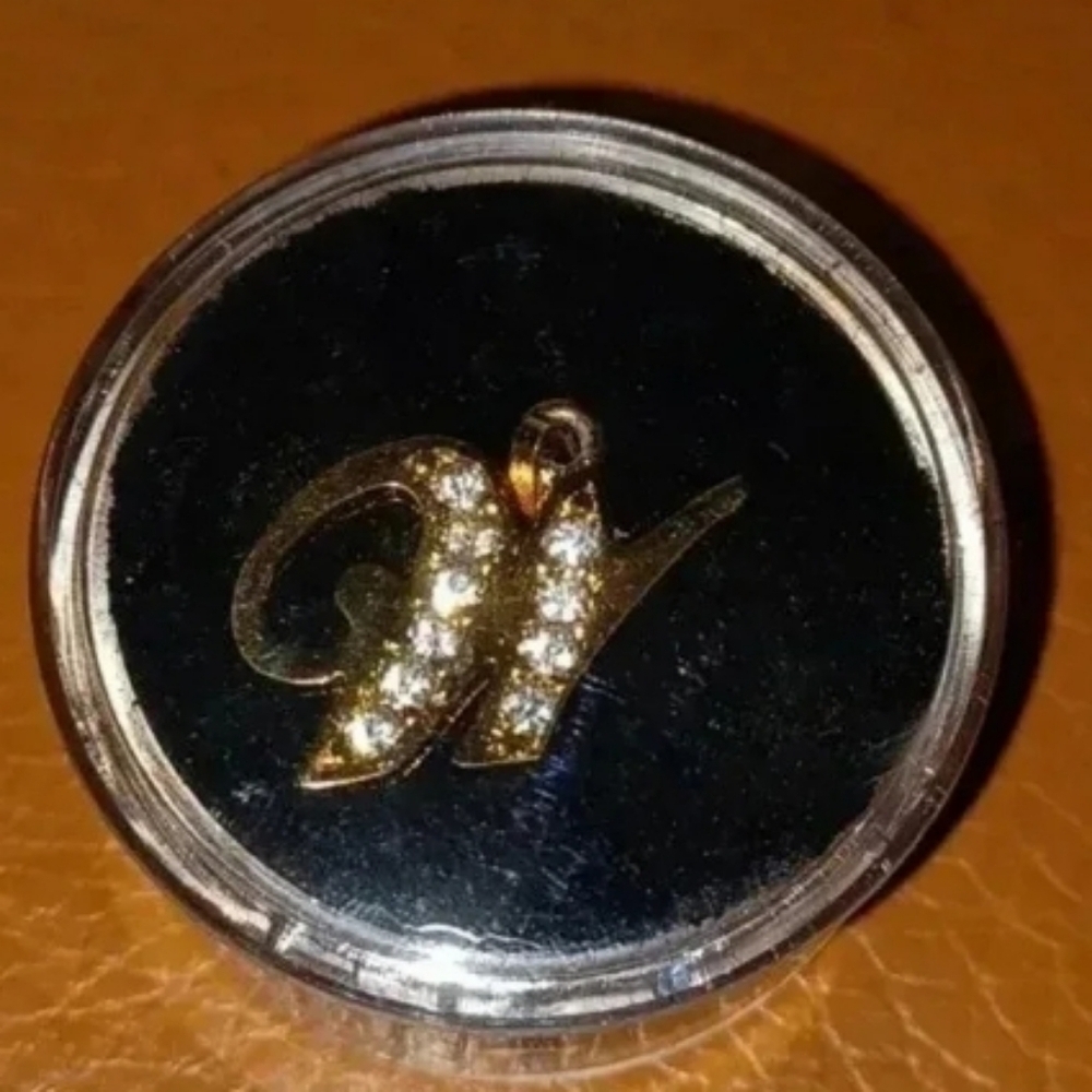 Gold plated letter pendant "W" with faux diamonds